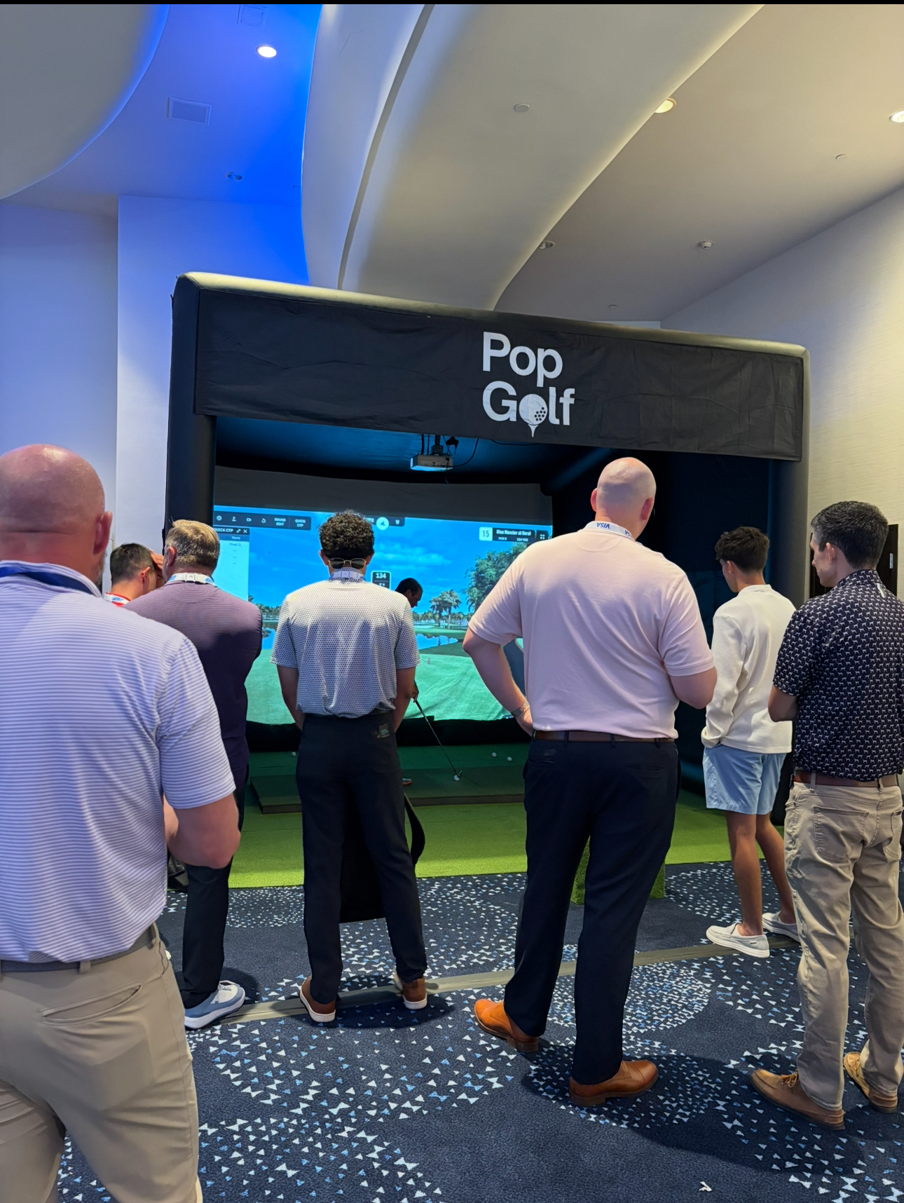 Attendees gathered around PopGolf at the Fontainebleau conference